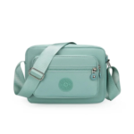 Mint Green Compact Crossbody Sling Bag with Front Zipper Pocket