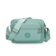 Mint Green Compact Crossbody Sling Bag with Front Zipper Pocket